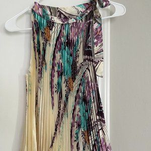 Brand New Silk Round-neck Sleeveless Blouse with Tie-it-yourself on the side.